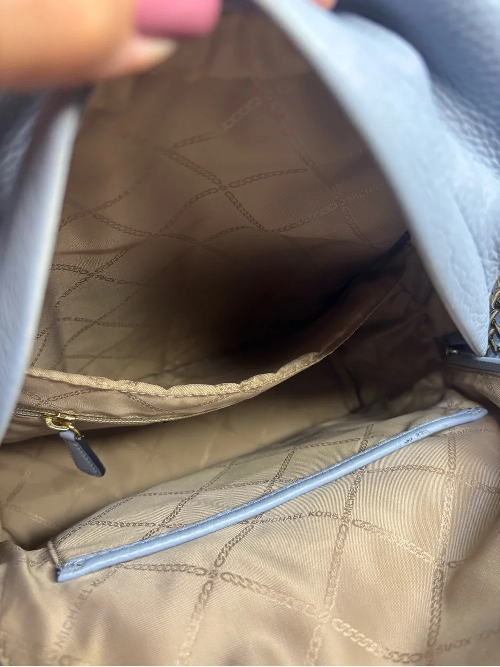 Michael Kors Slater Medium Pebbled Leather Backpack in a pale blue with dust bag